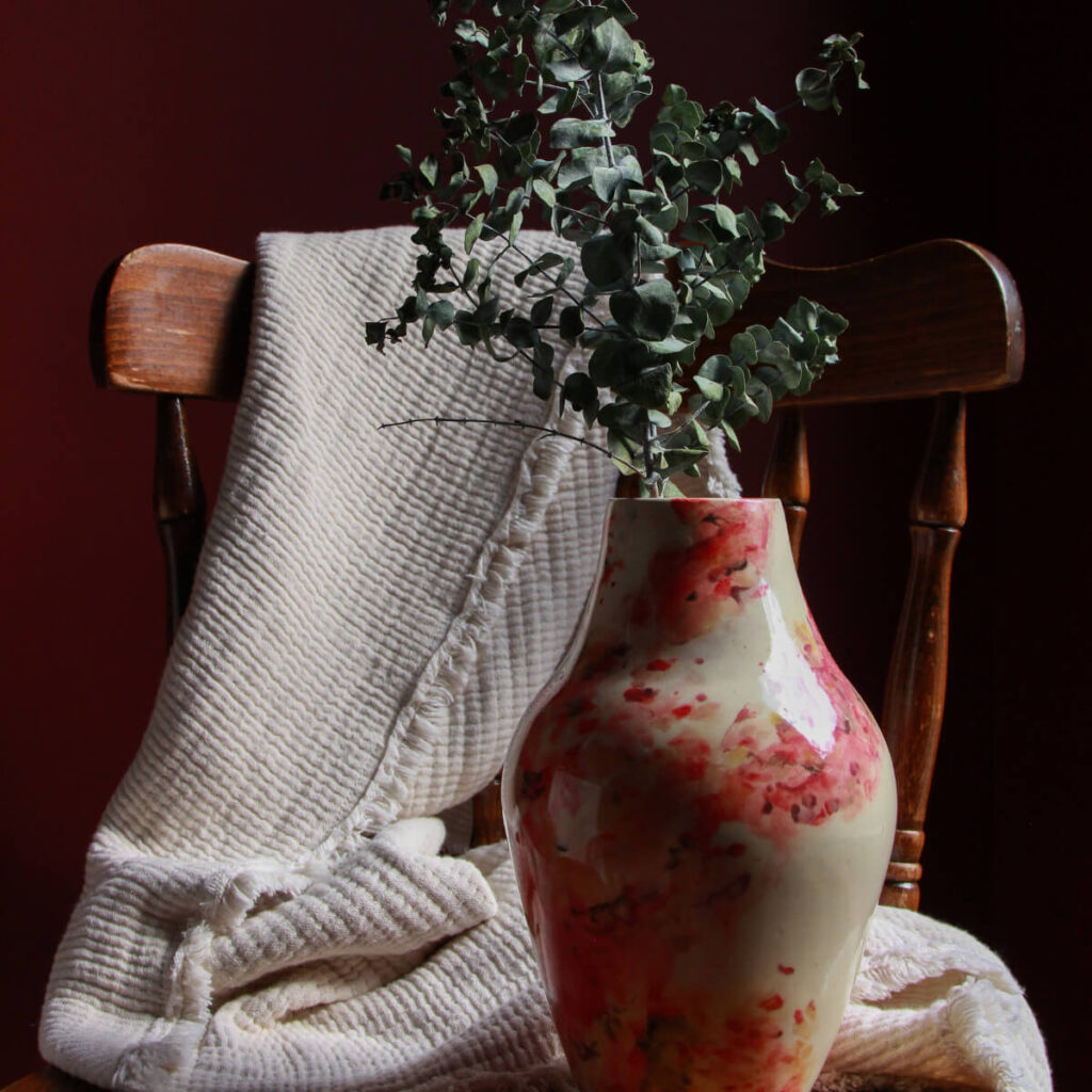 Bloom in Motion hand-painted ceramic vase with crimson and blush underglaze