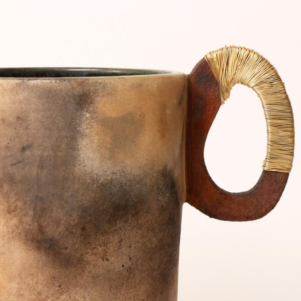 Forged Illusion contemporary ceramic vase with sculptural twin handles, front view