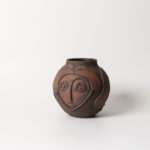 Gulara handmade ceramic face vase on white background