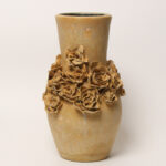 Juliet sculptural ceramic vase with hand-built rose band on white background