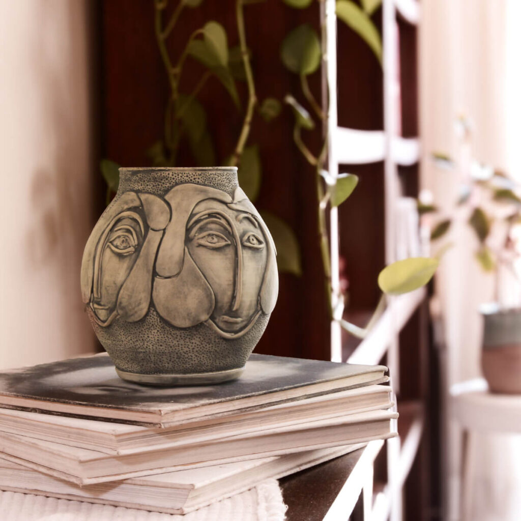 Mahdis handmade ceramic face vase on white background