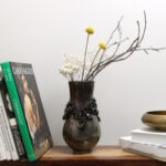 Midnight Rose luxury ceramic vase with sculpted floral details on white background