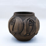 Sohalia handmade ceramic face vase on white background