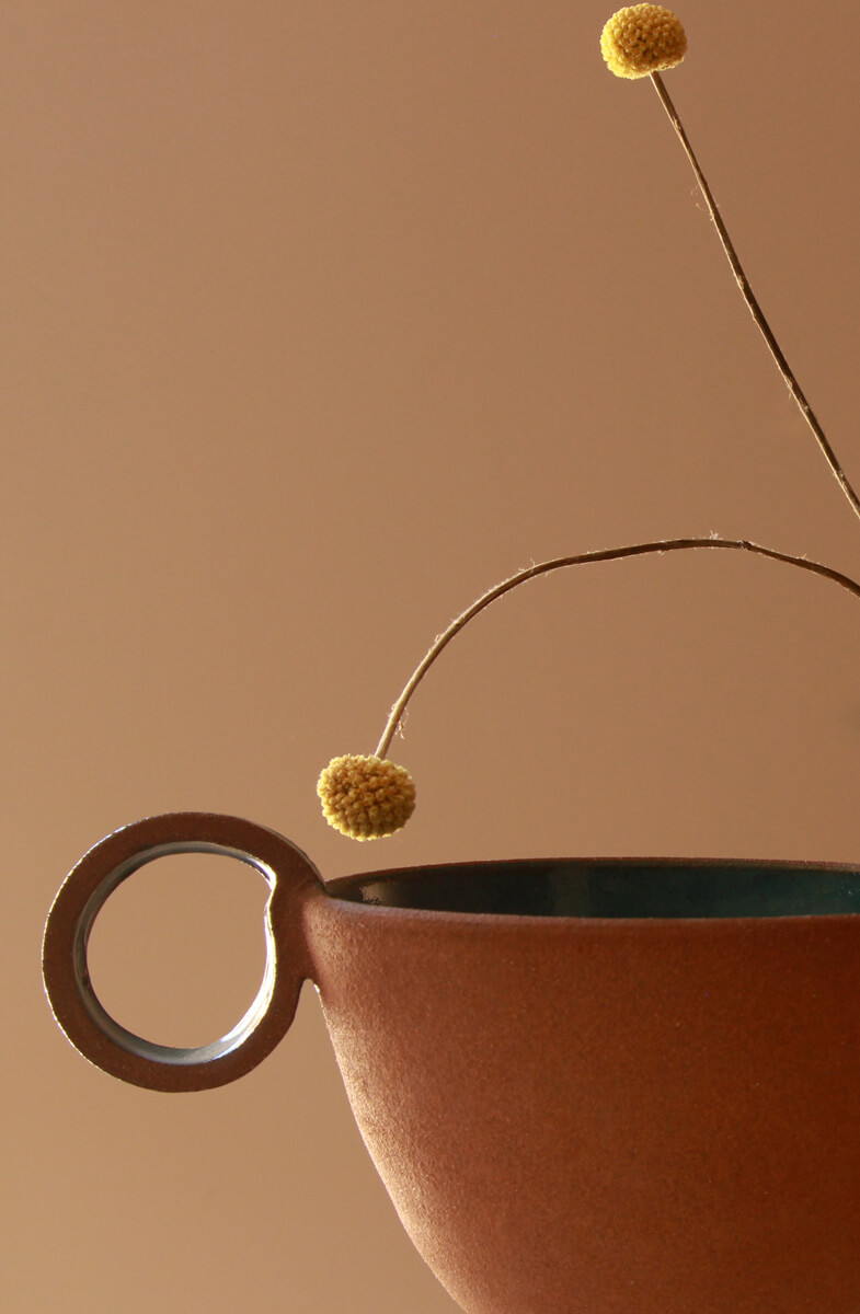 Close-up of Balance ceramic bowl rim and handle detail