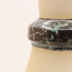 Close-up detail of Emphasis ceramic vase glossy umber collar