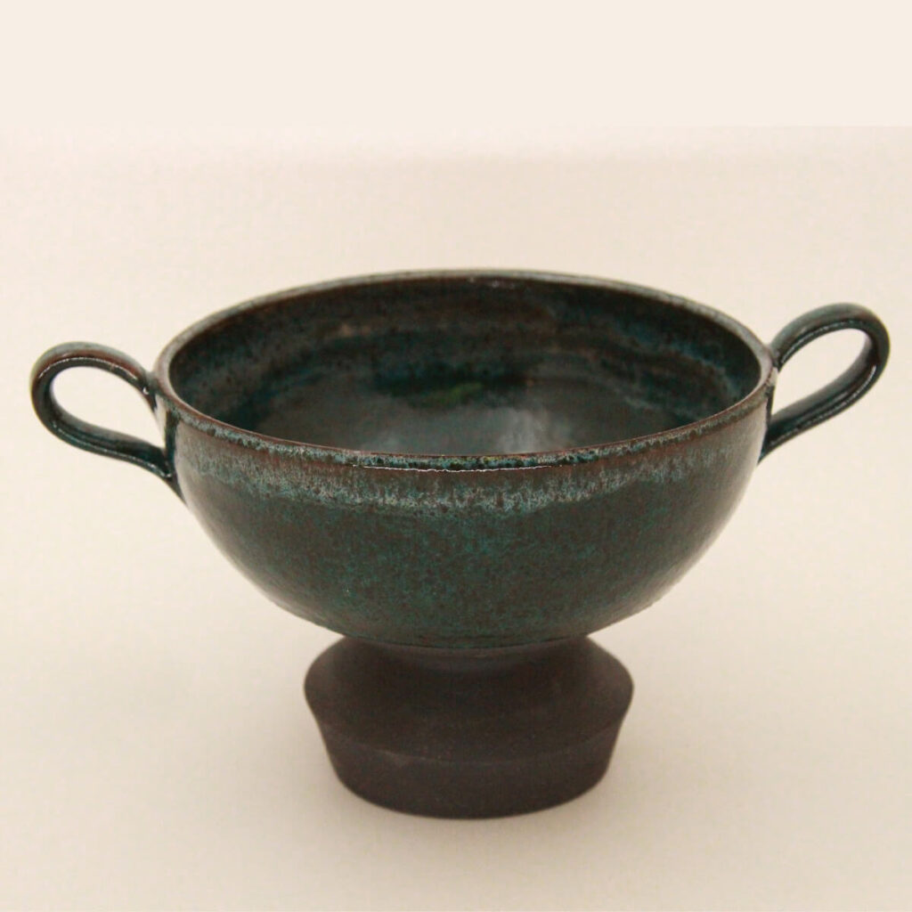Industral handmade ceramic bowl with side handles and footed base
