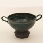 Industral handmade ceramic bowl with side handles and footed base