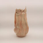 Pink Lady decorative ceramic vase on neutral background
