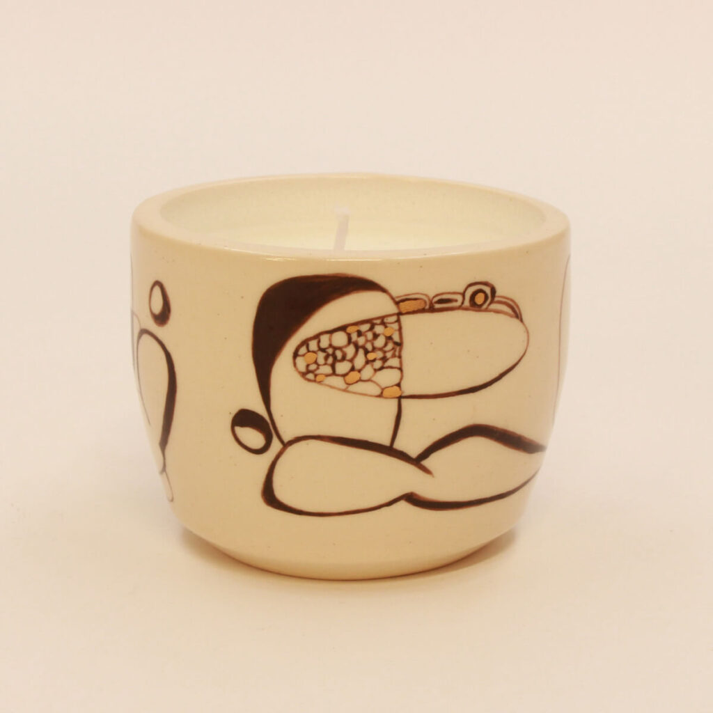 Pose of Peace handmade ceramic candle holder with scented candle