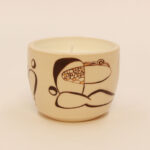 Pose of Peace handmade ceramic candle holder with scented candle