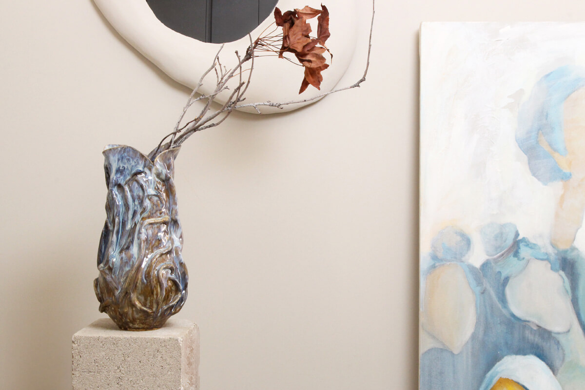 Resting with the Sea ceramic vase styled with branches
